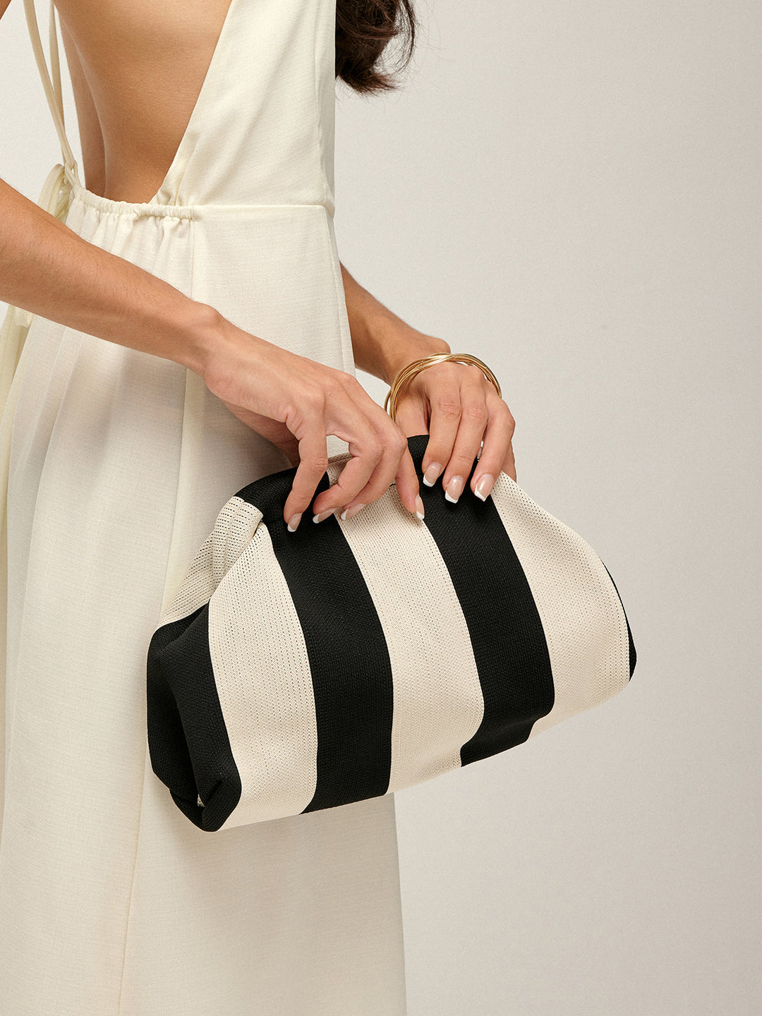İki tonlu çizgili clutch çanta