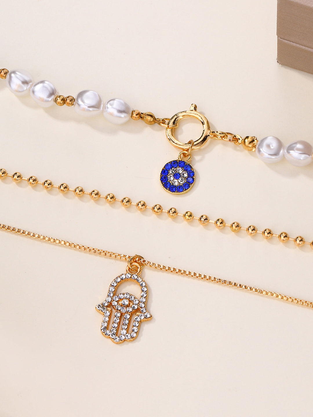 Şık Görünüm İçin İnci ve Hamsa El Desenli Çocuk Bezi Kolye Seti